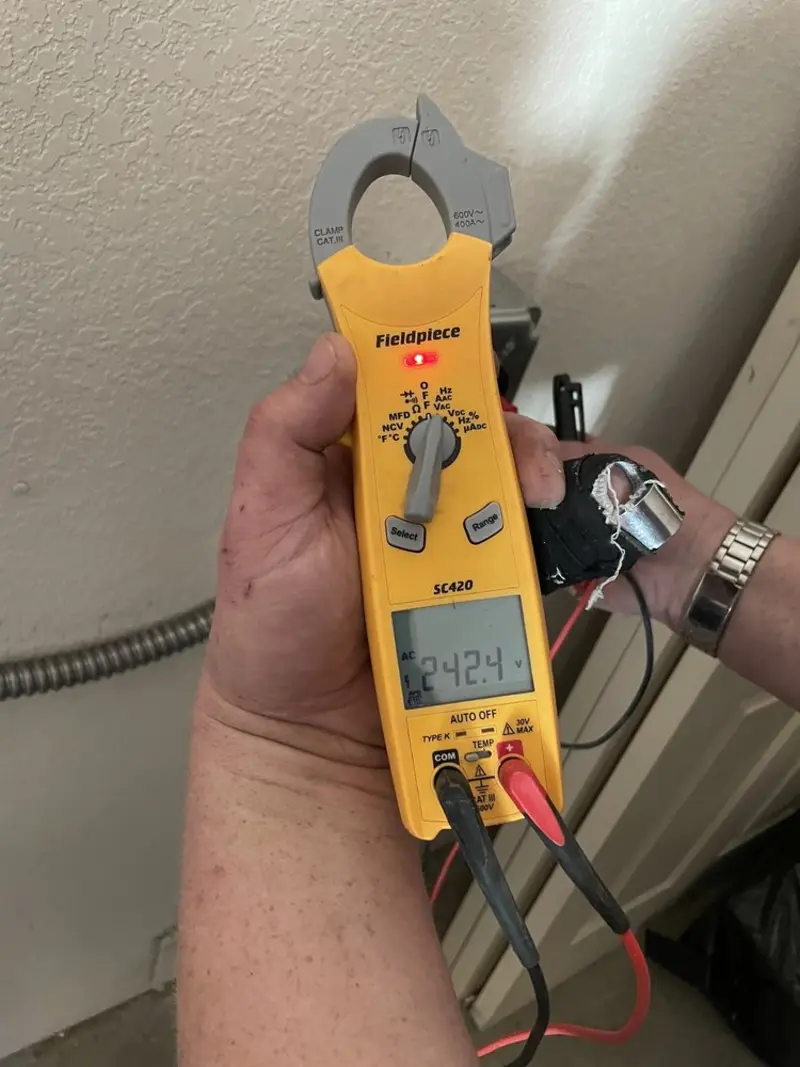 Voltage testing with clamp meter during Generator Installation in East Hanover